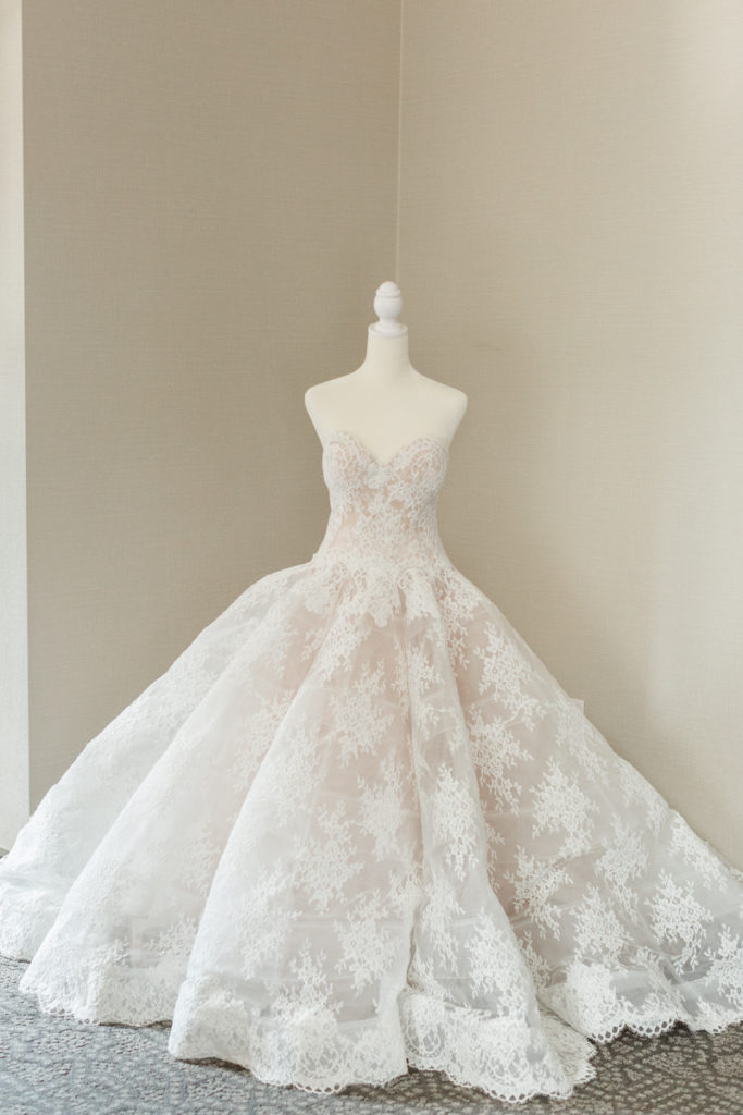 monique lhuillier wedding gown on a dress form the morning of the wedding