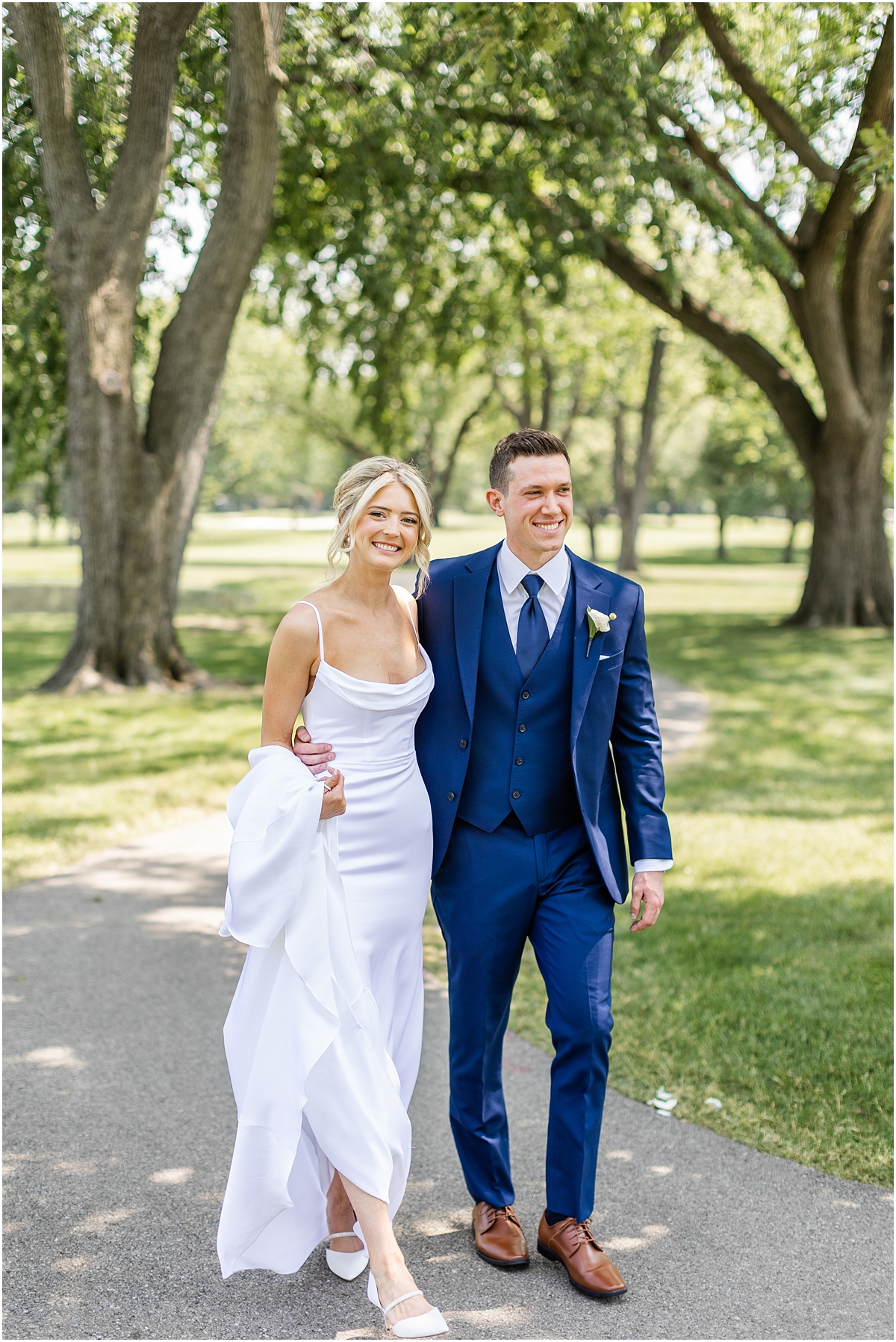 wedding portraits of bride and groom at River Forest Country Club 