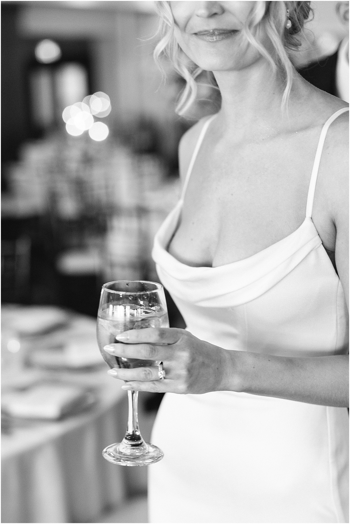bride holding wine from Classic and Romantic Wedding at River Forest Country Club 