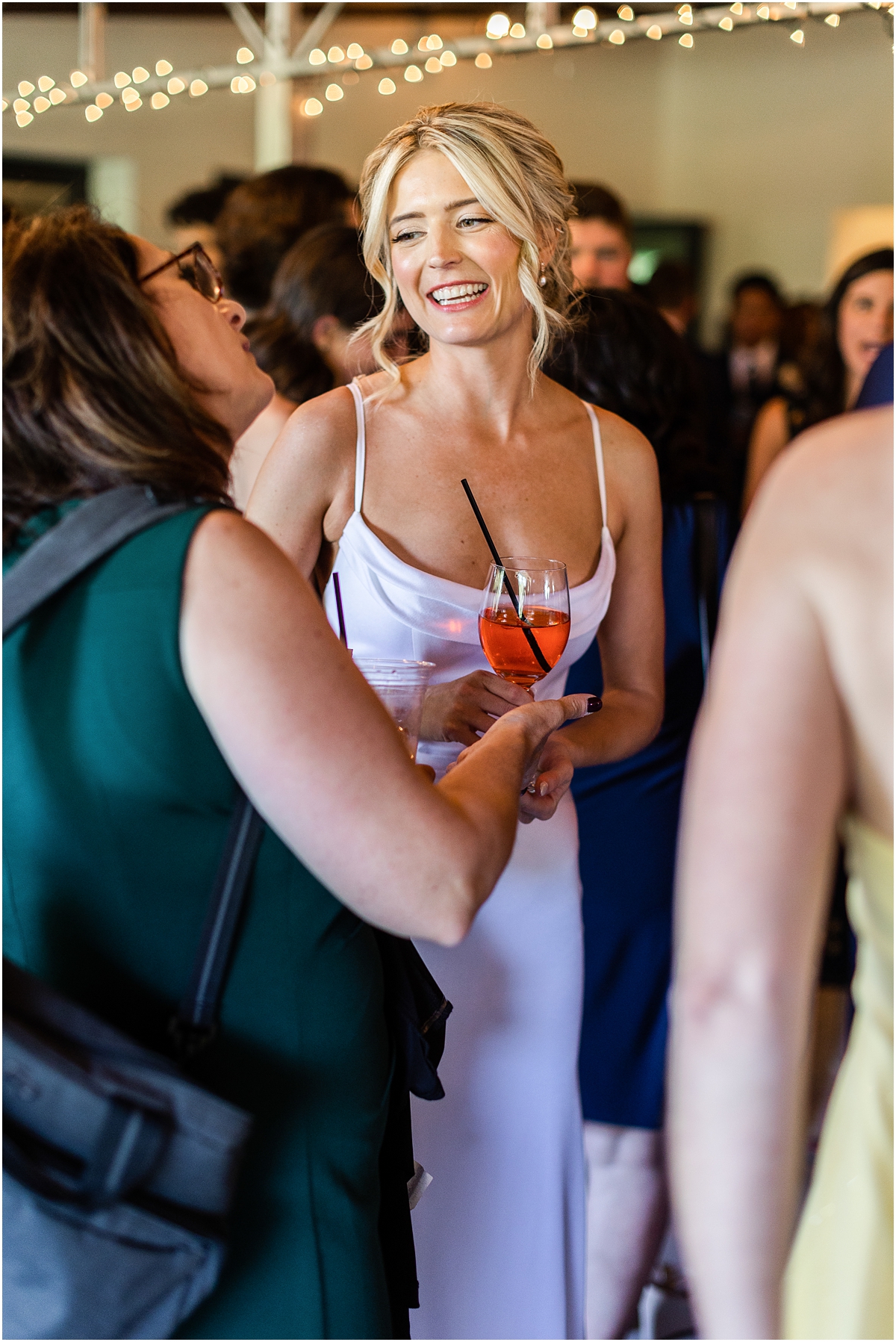 bride talking with guests 