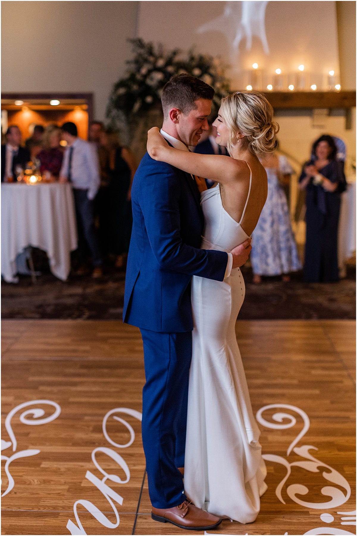 candid moment of newlyweds sharing first dance