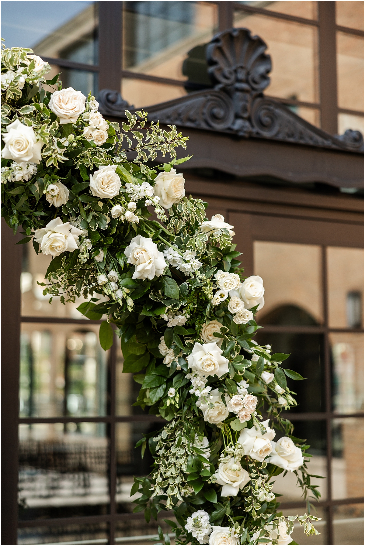 stunning white florals from outdoor wedding ceremony at Revel Motor Row