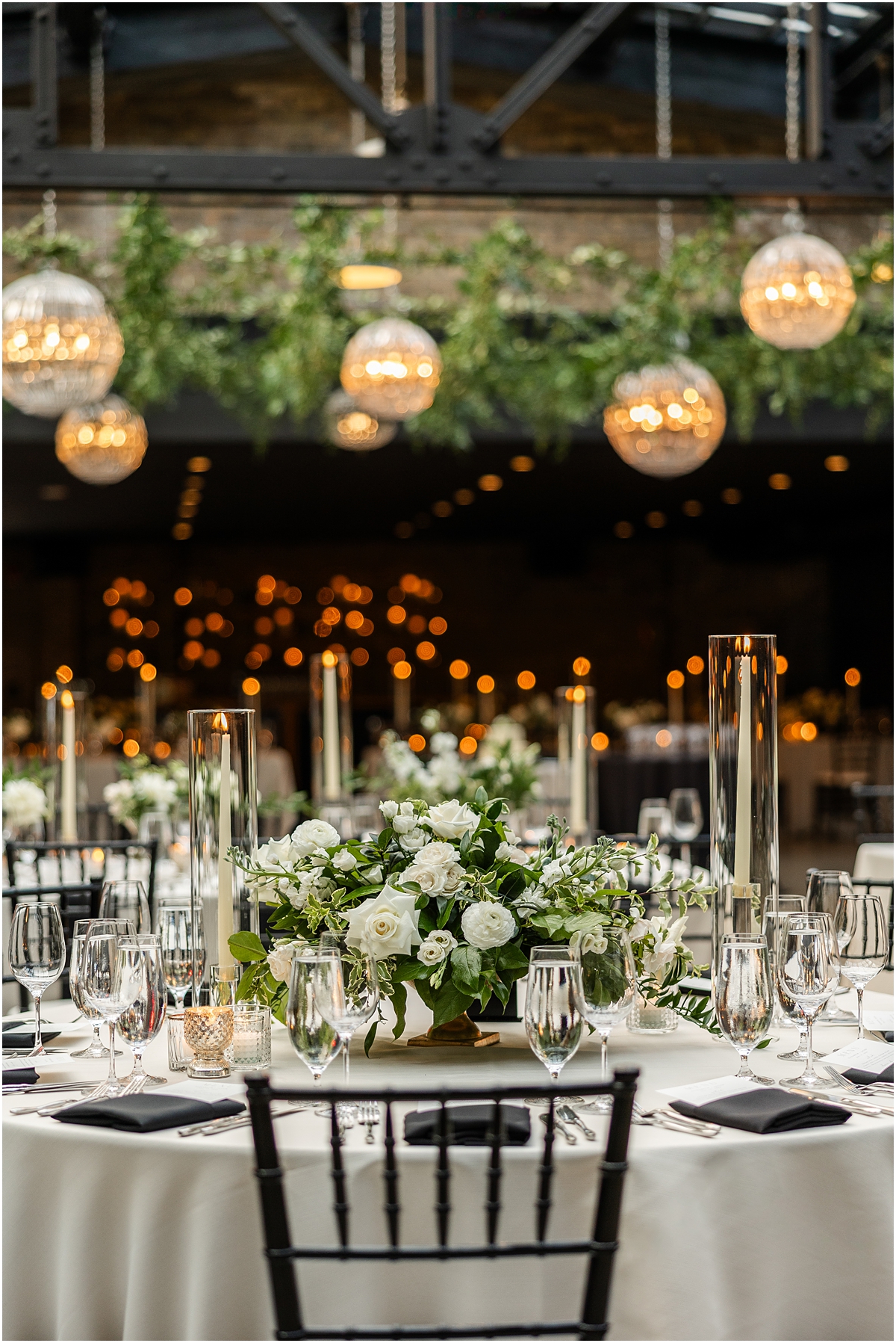 chic garden inspired tables capes and reception details from Revel Motor Row wedding