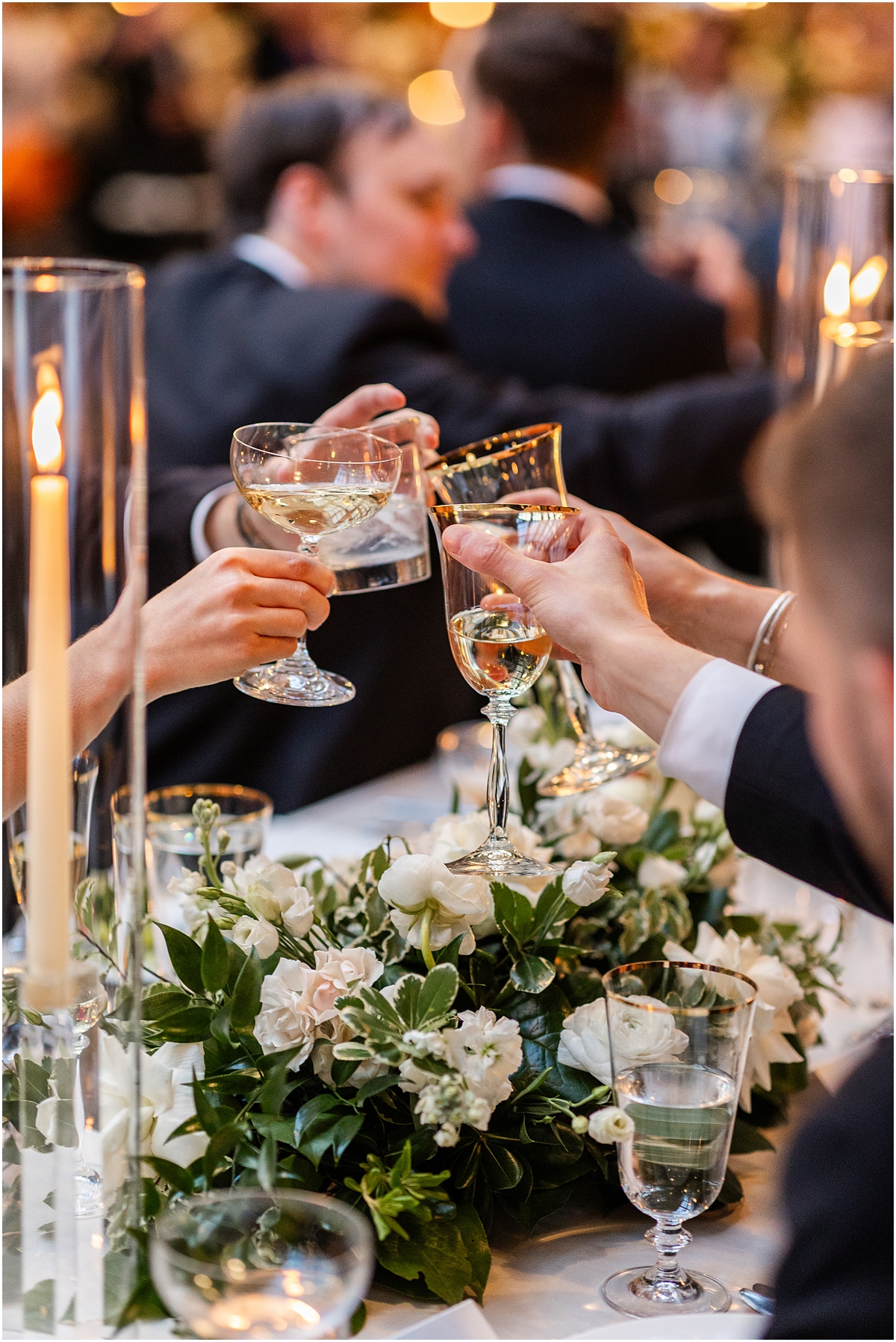 guests cheers with glasses