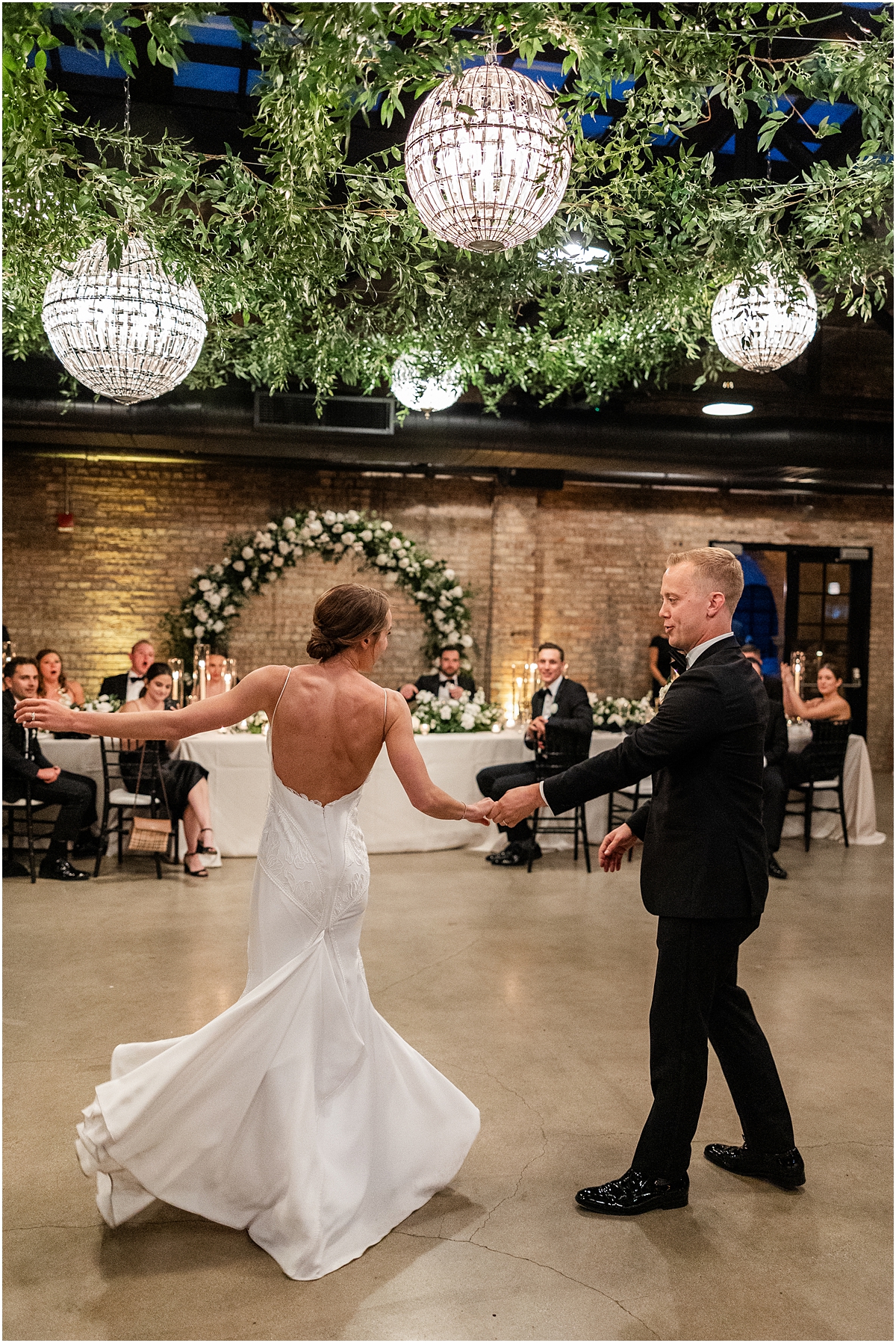 newlyweds dancing at wedding reception