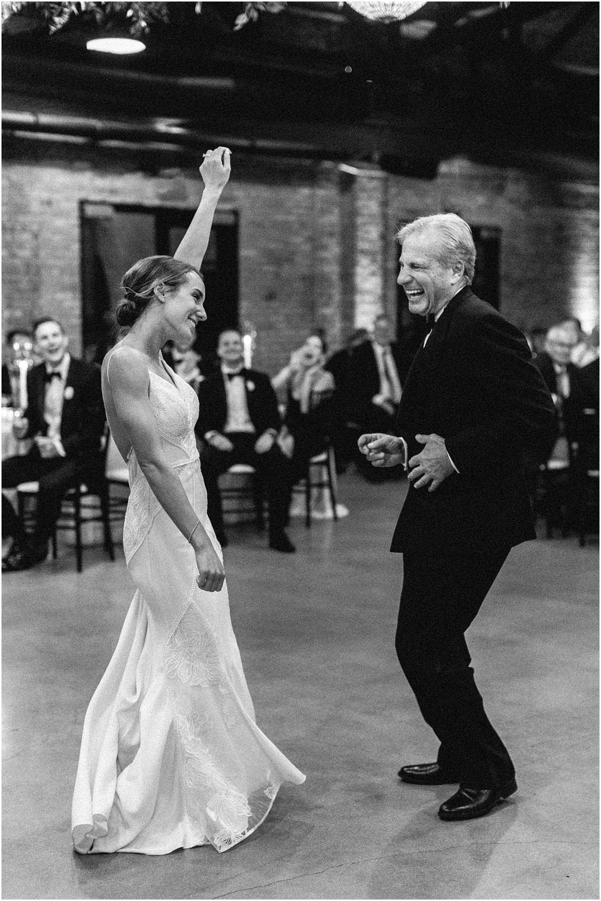 bride and father have fun on the dance floor