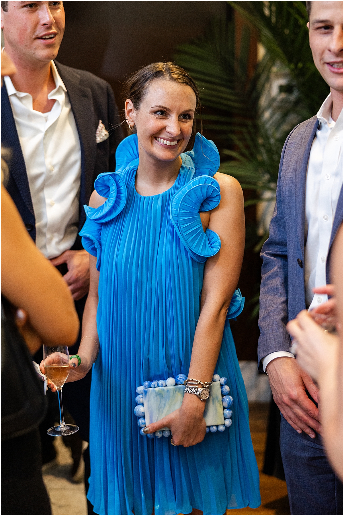 wedding guest in blue dress