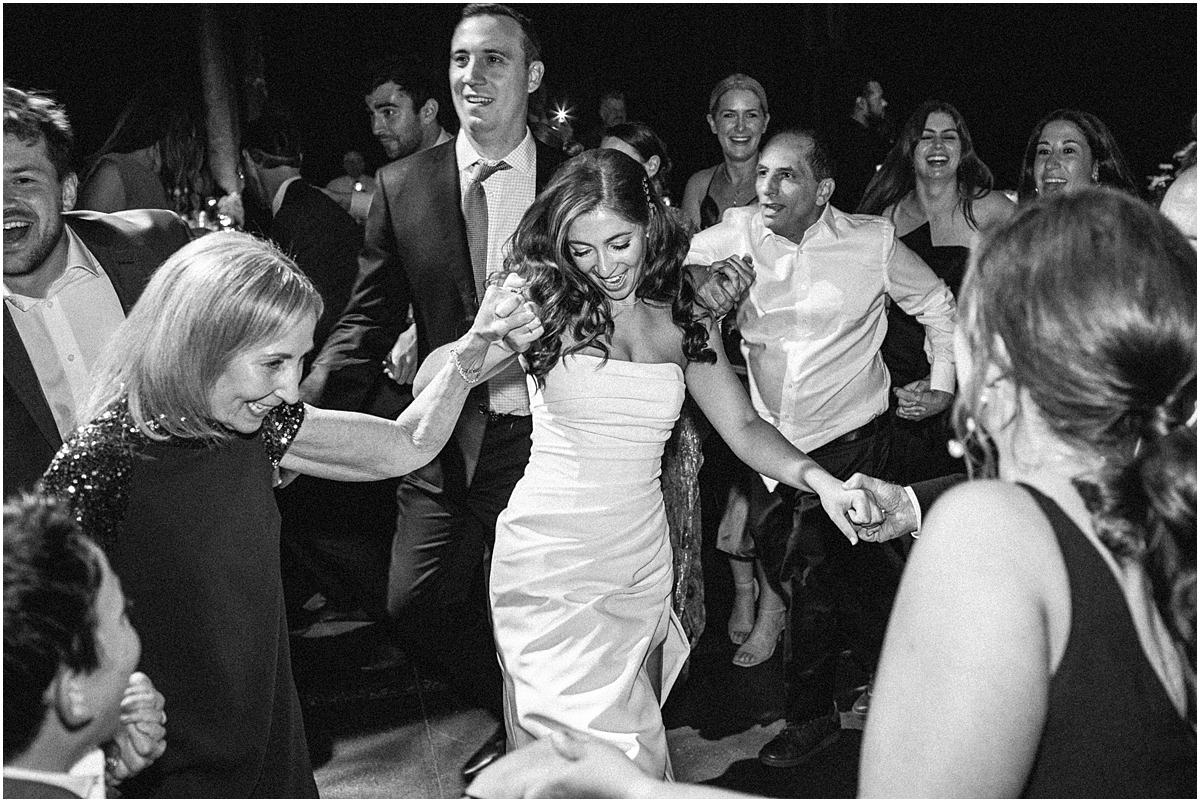 bride dances with guests