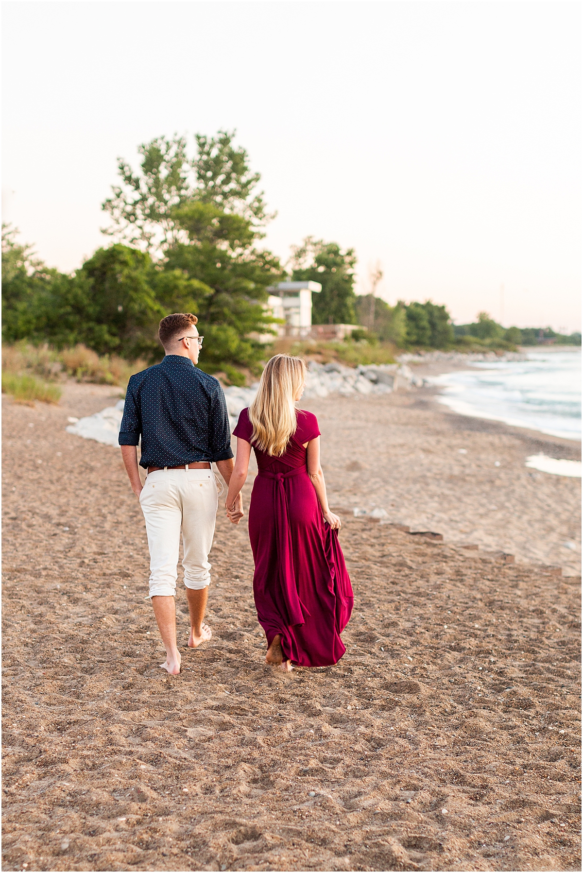 Romantic engagement on the lakeshore beach 