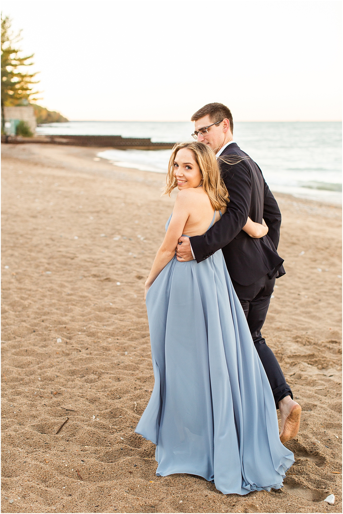 beach engagement session on the shores of Lake Michigan 