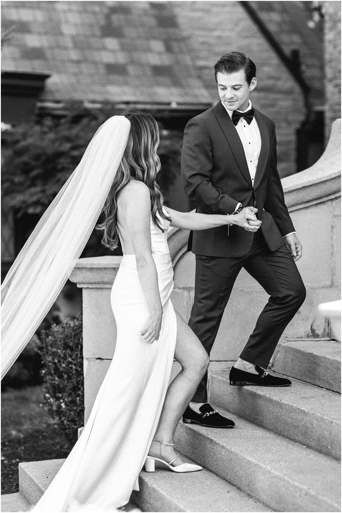 couple walk up stairs at The Covenant At Murray Mansion