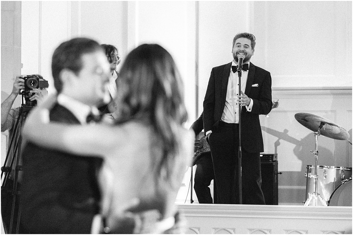 groom's best friend sings wedding song for bride and groom