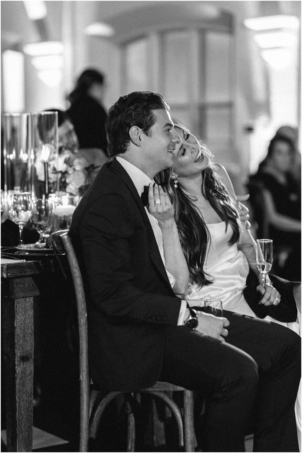 candid portraits of newlyweds listening to toasts