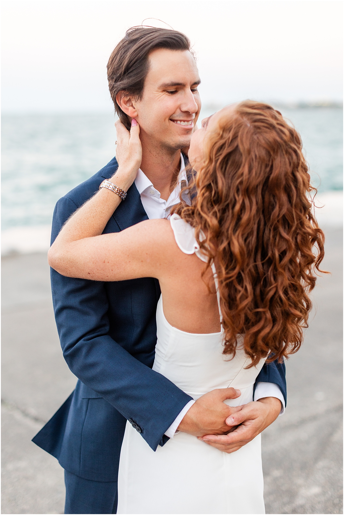 candid engagement portraits at North Avenue Beach