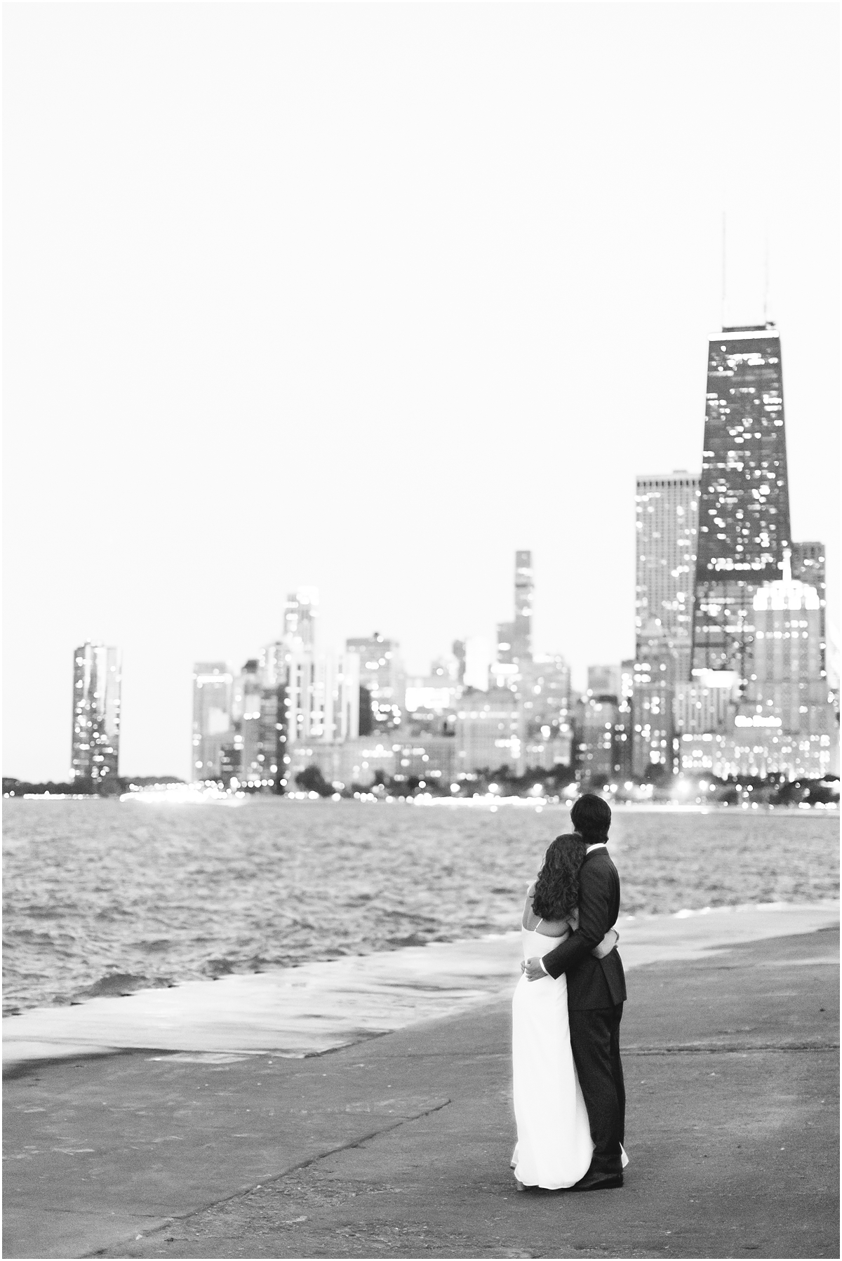 romantic engagement portraits of couple taking in the Chicago city skyline