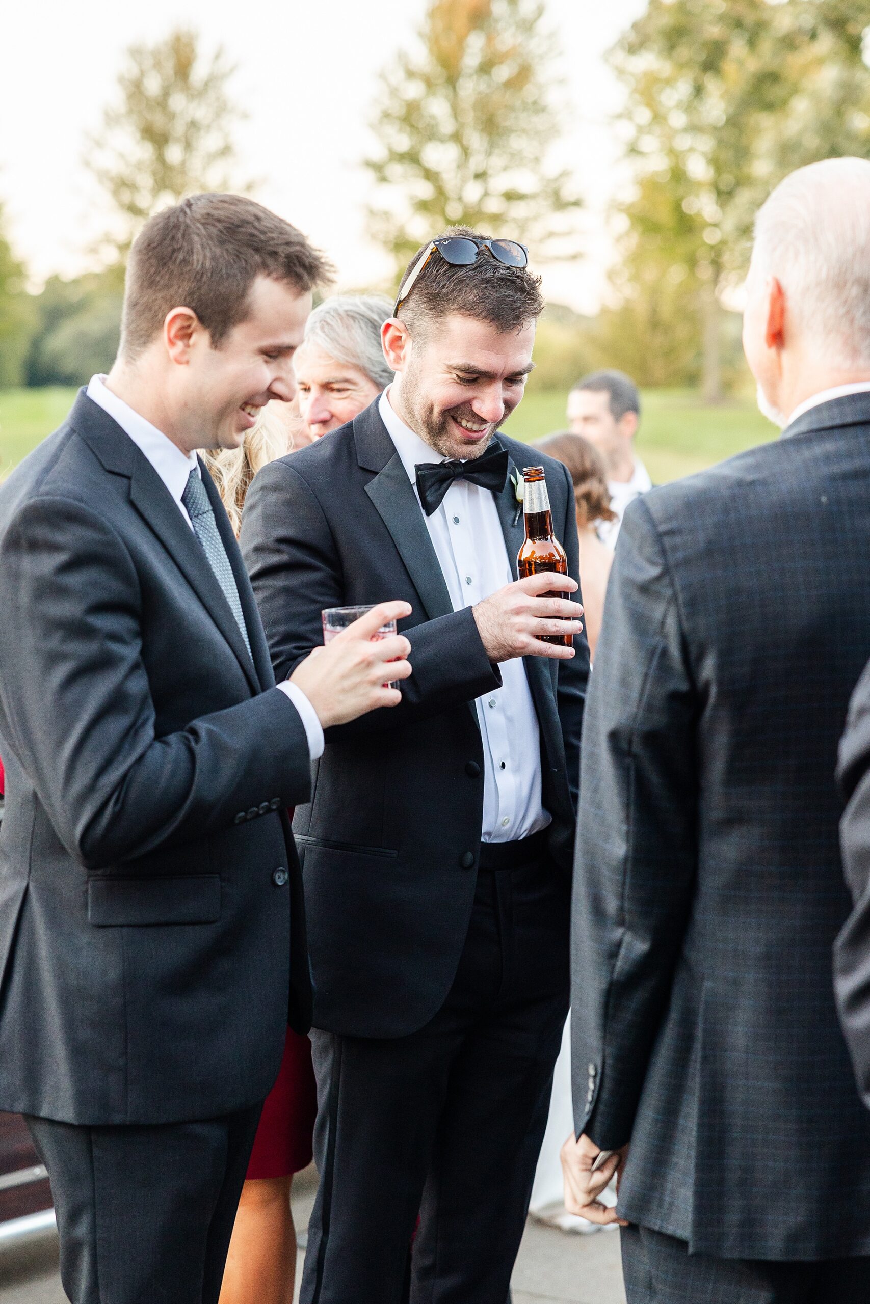 groomsmen during cocktail hour