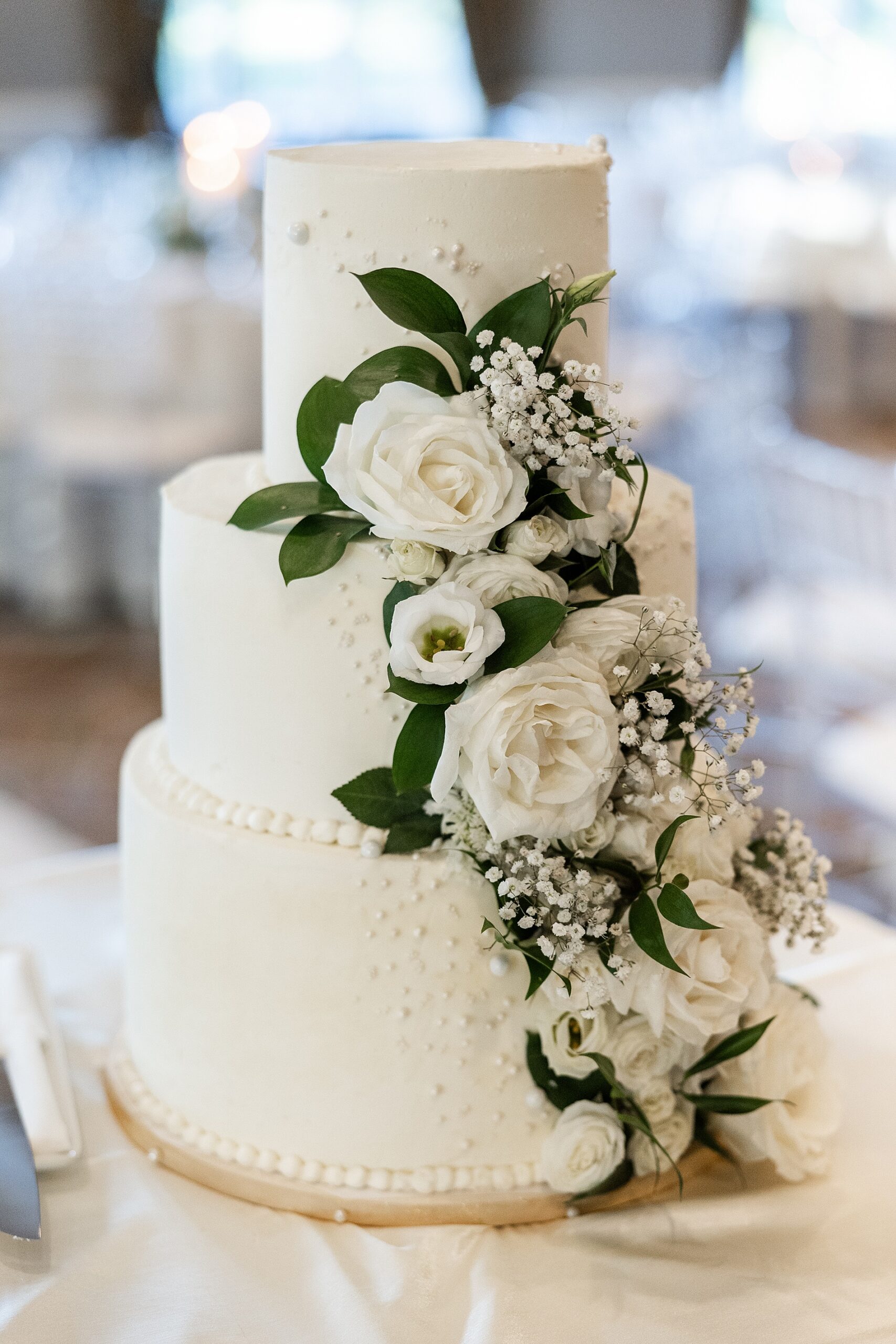 classic wedding cake decorated with white flowers