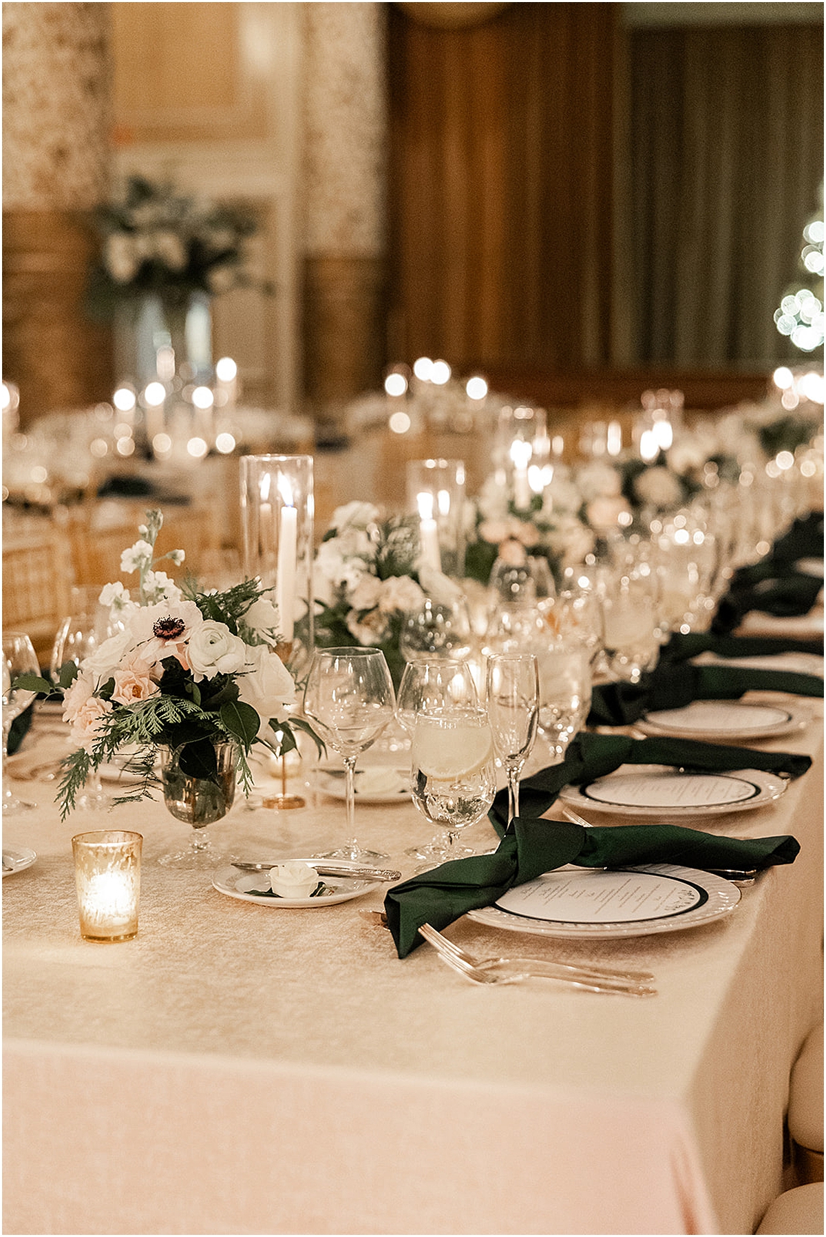 white flower centerpieces and candles at Elegant Chicago Winter Wedding