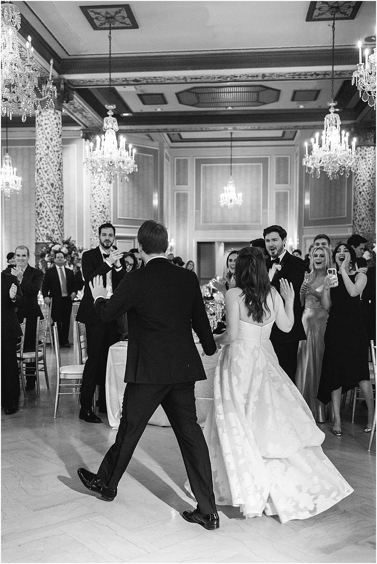 bride and groom enter reception 