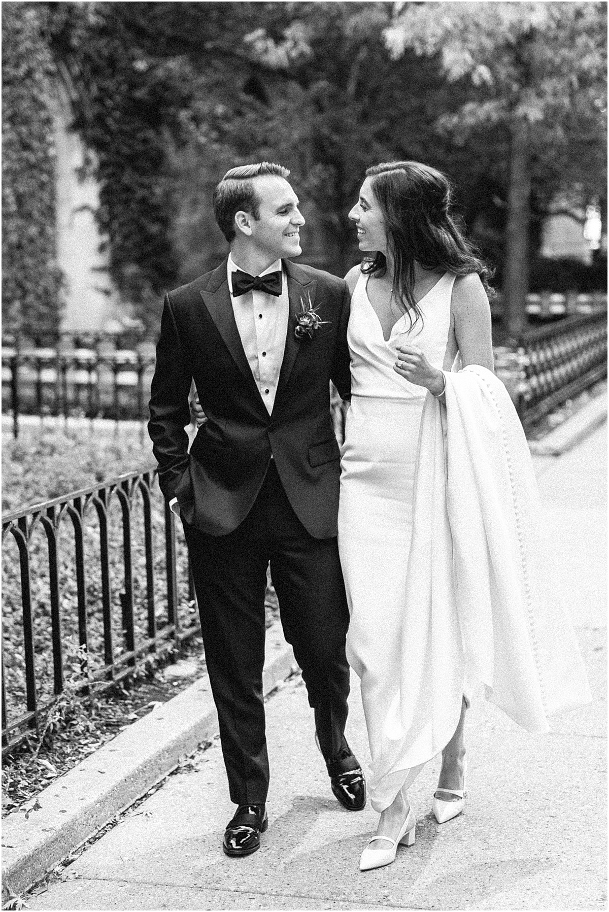 newlyweds walk together in downtown Chicago