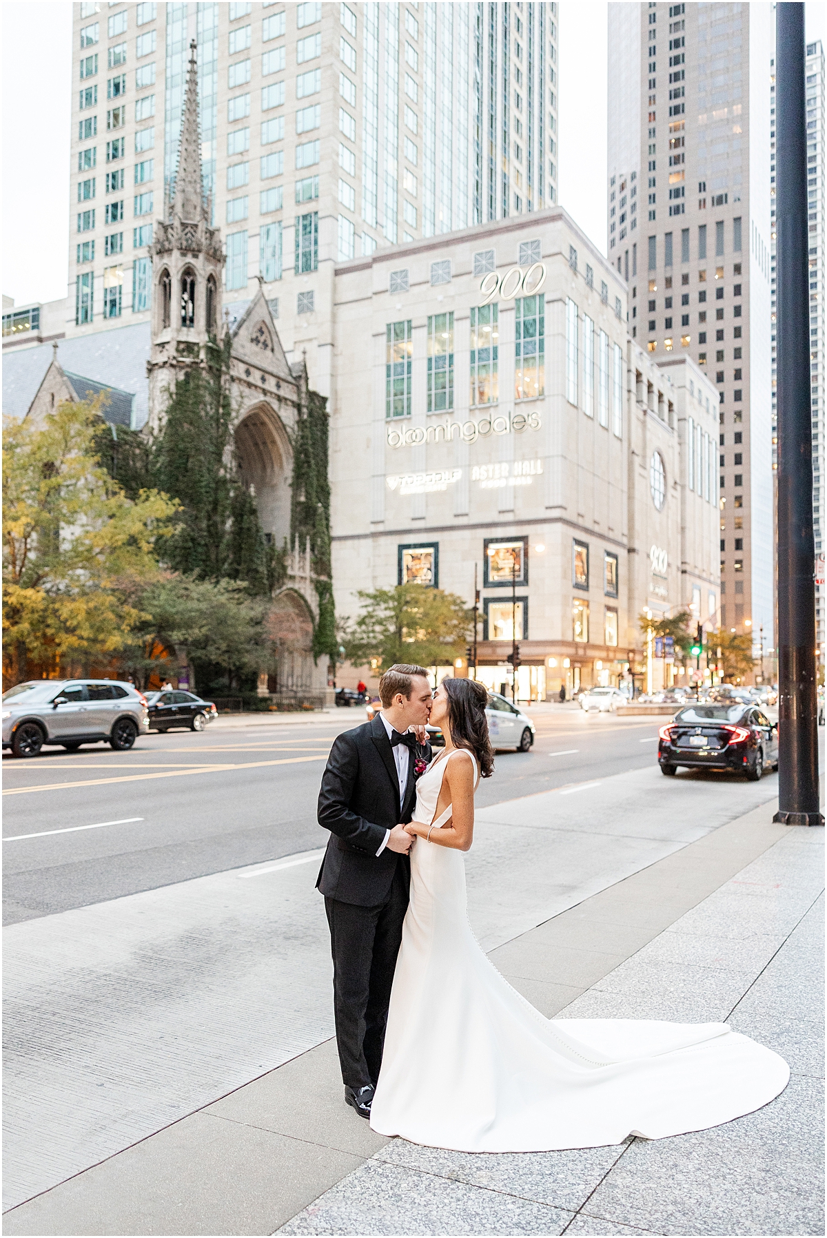 bride and groom walk down Gold Coast of Chicago 