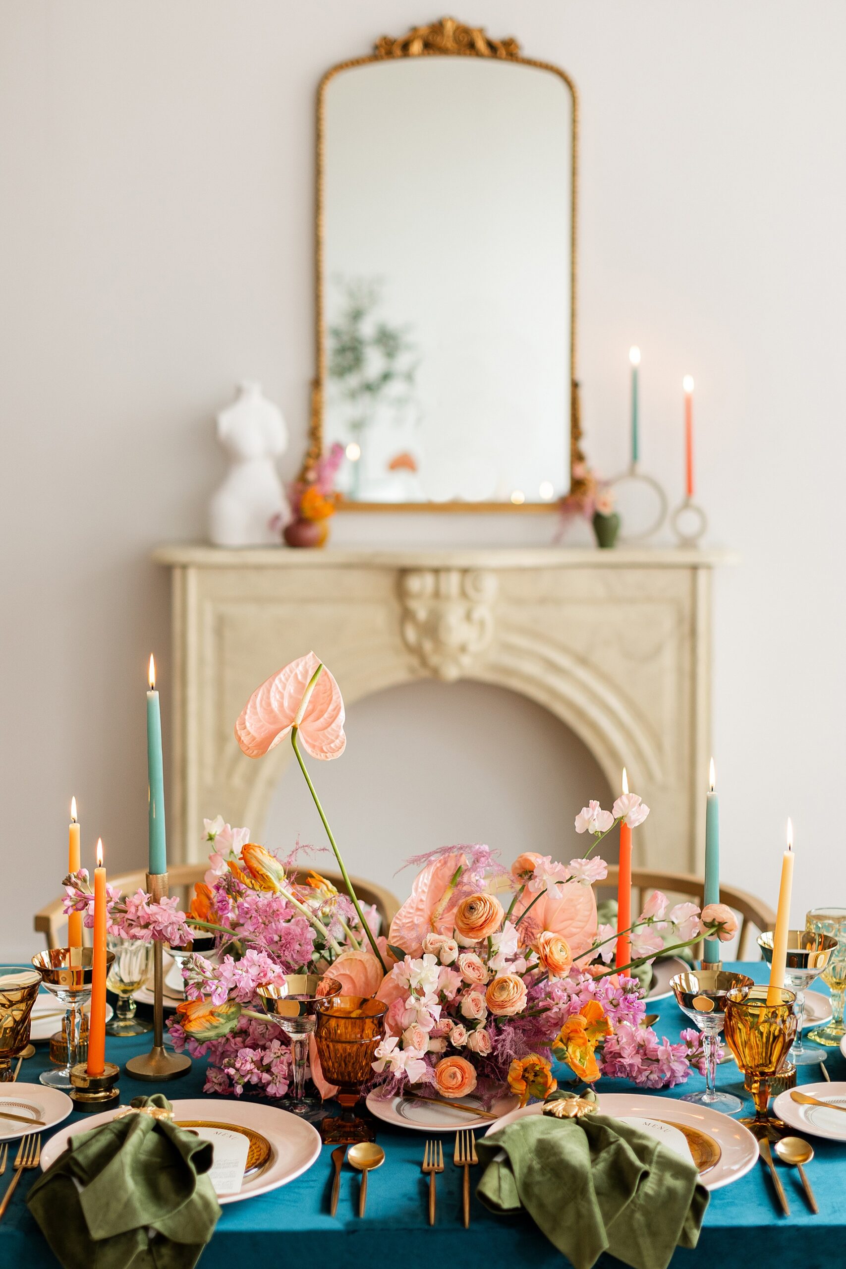 orange and pink flowers on center of table