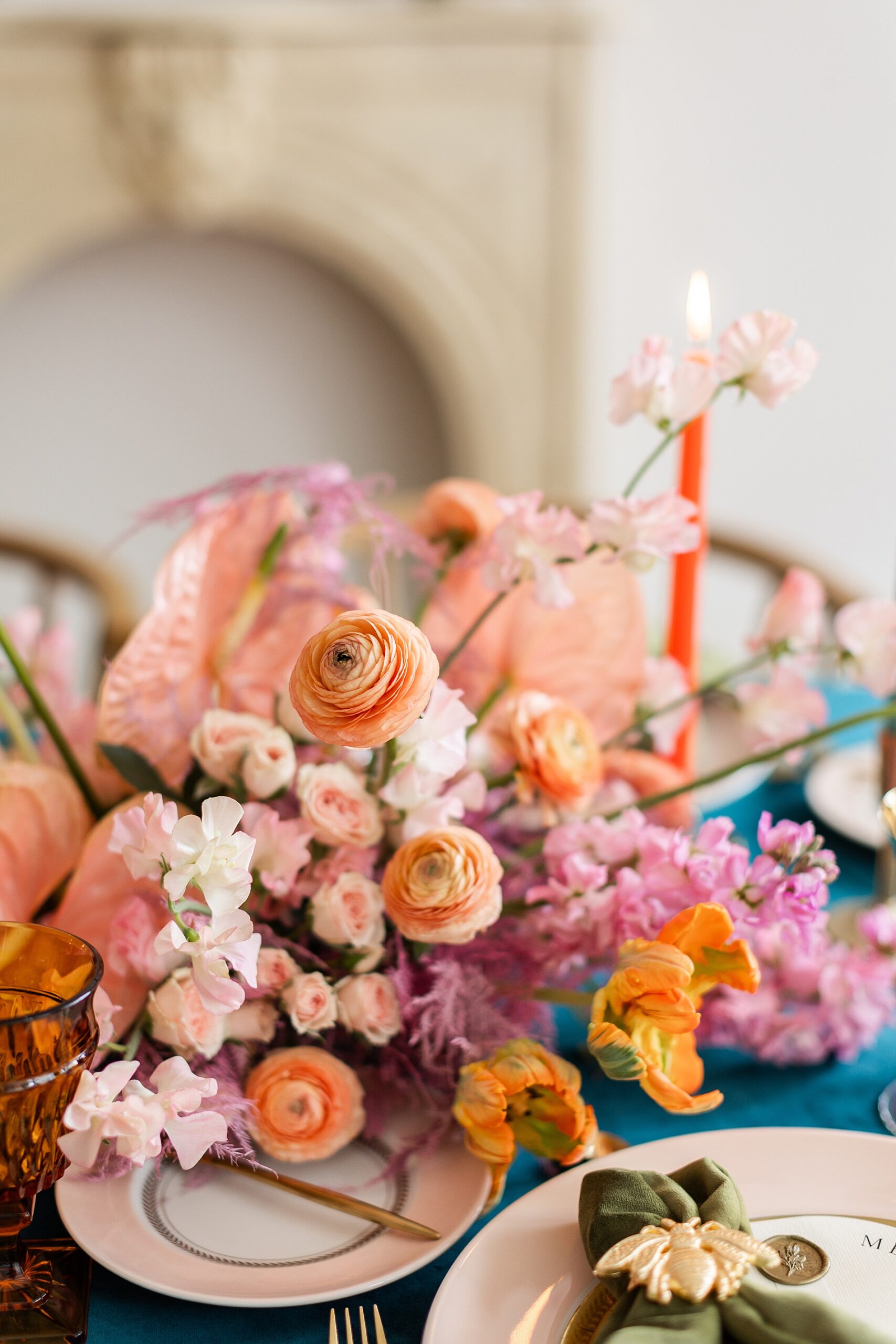flower centerpieces with flowers in pink and orange