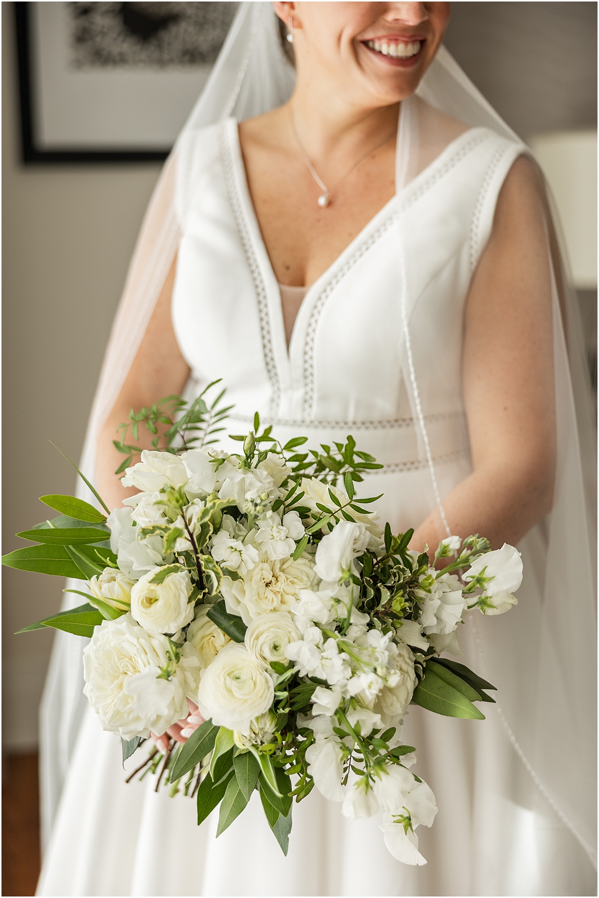 timeless bridal bouquet of white blooms and greenery