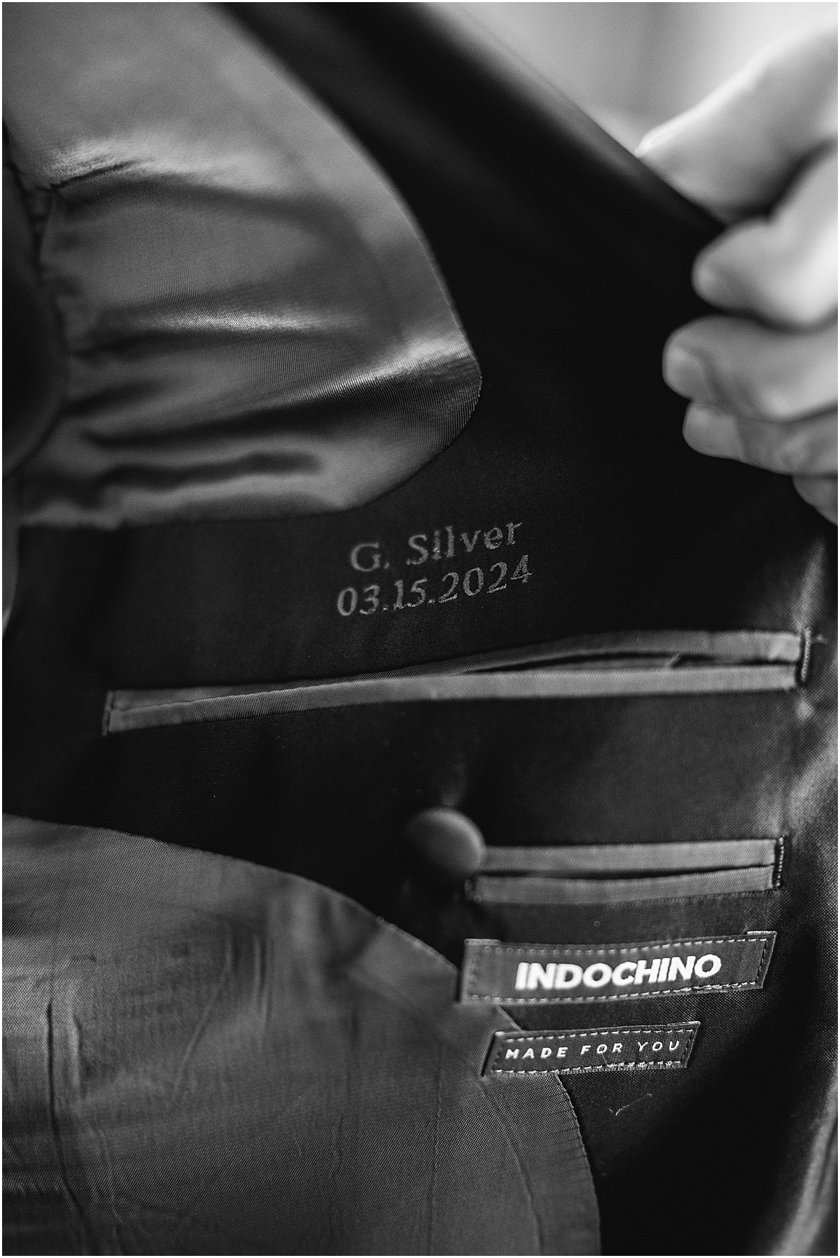 personalized name and wedding date stitched into groom's vest