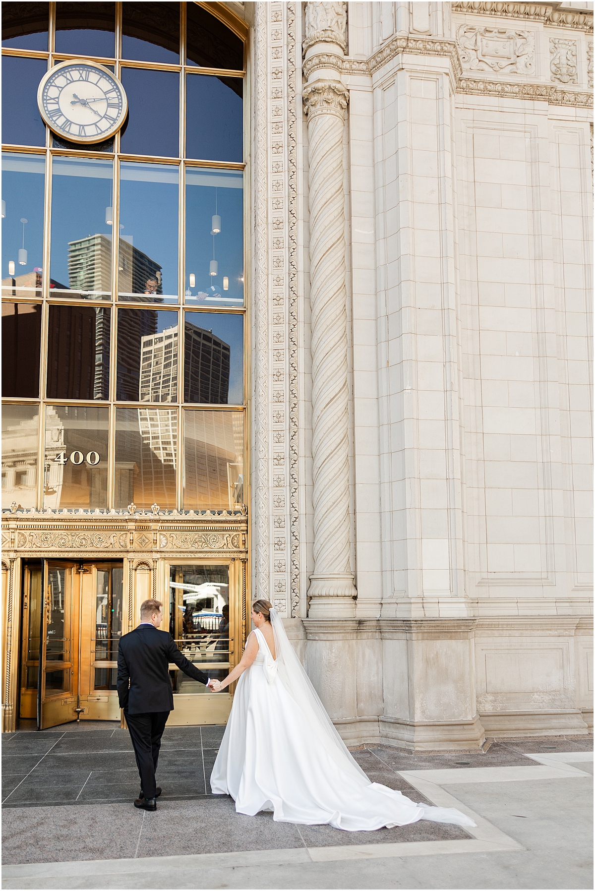 couple walk towards building in Chicago