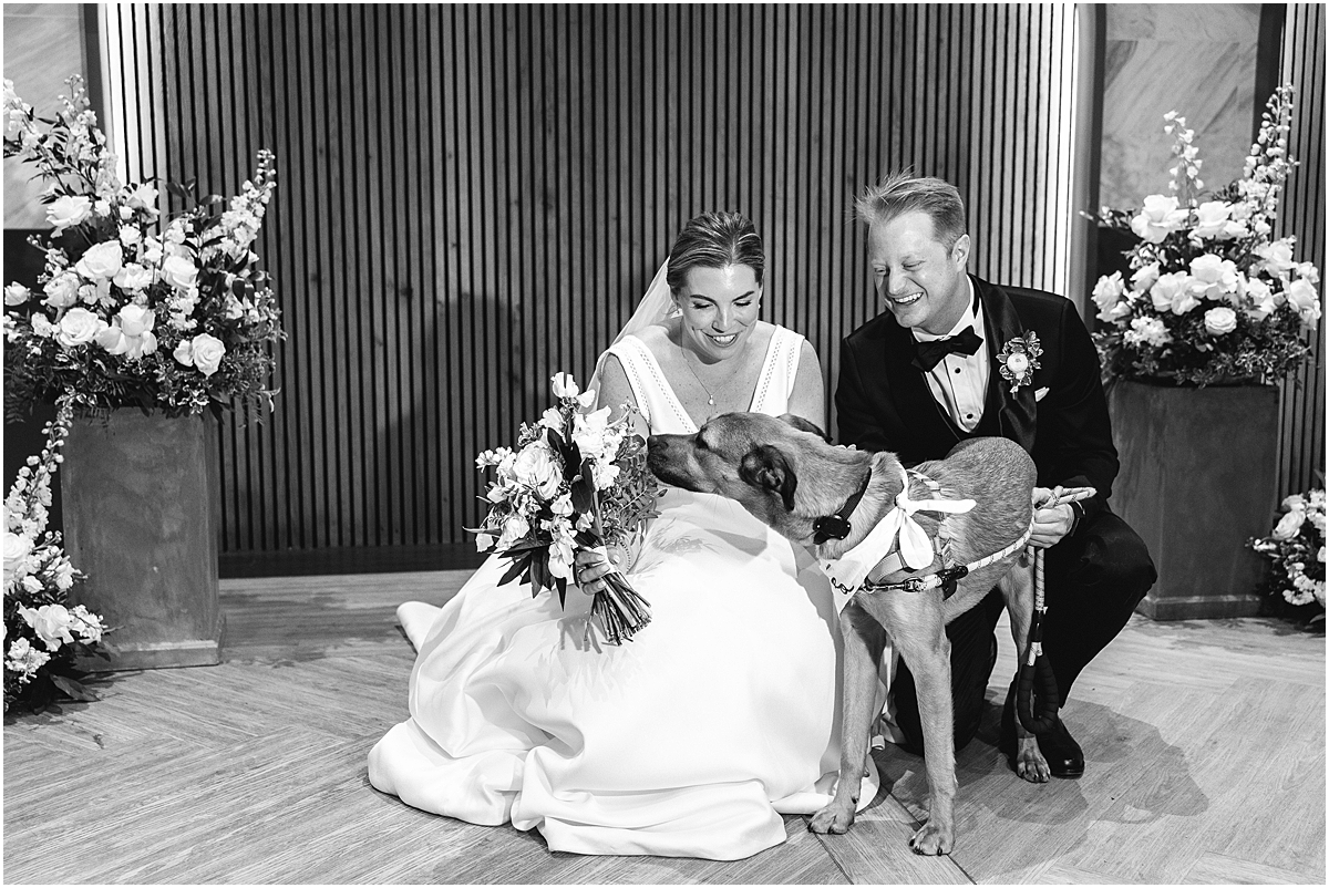 newlyweds with their dog