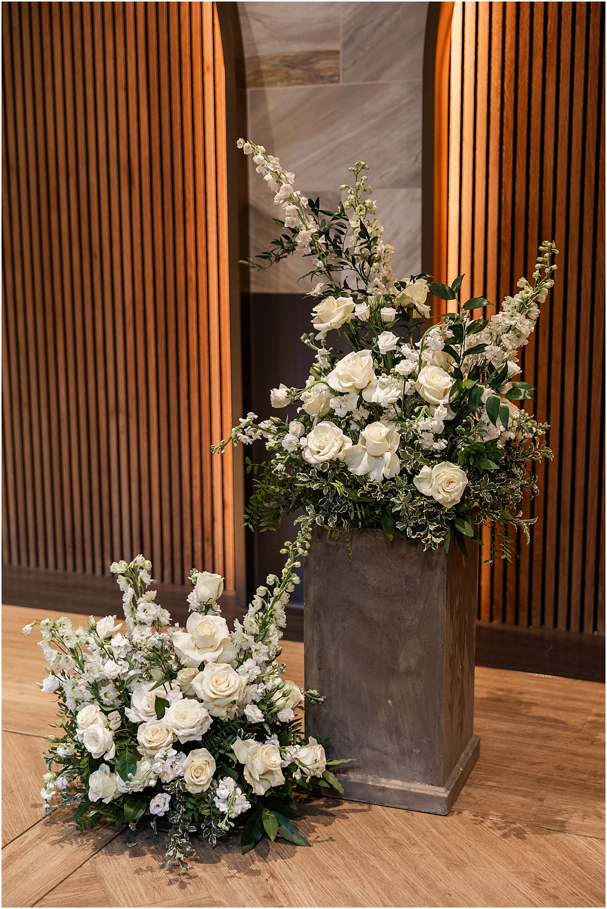classic wedding floral arrangements with white roses and greenery