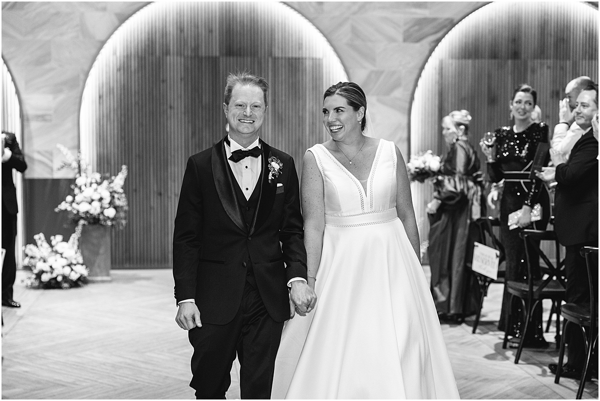 newlyweds exit wedding ceremony