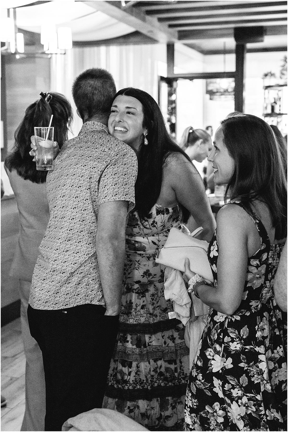 bride hugs guests
