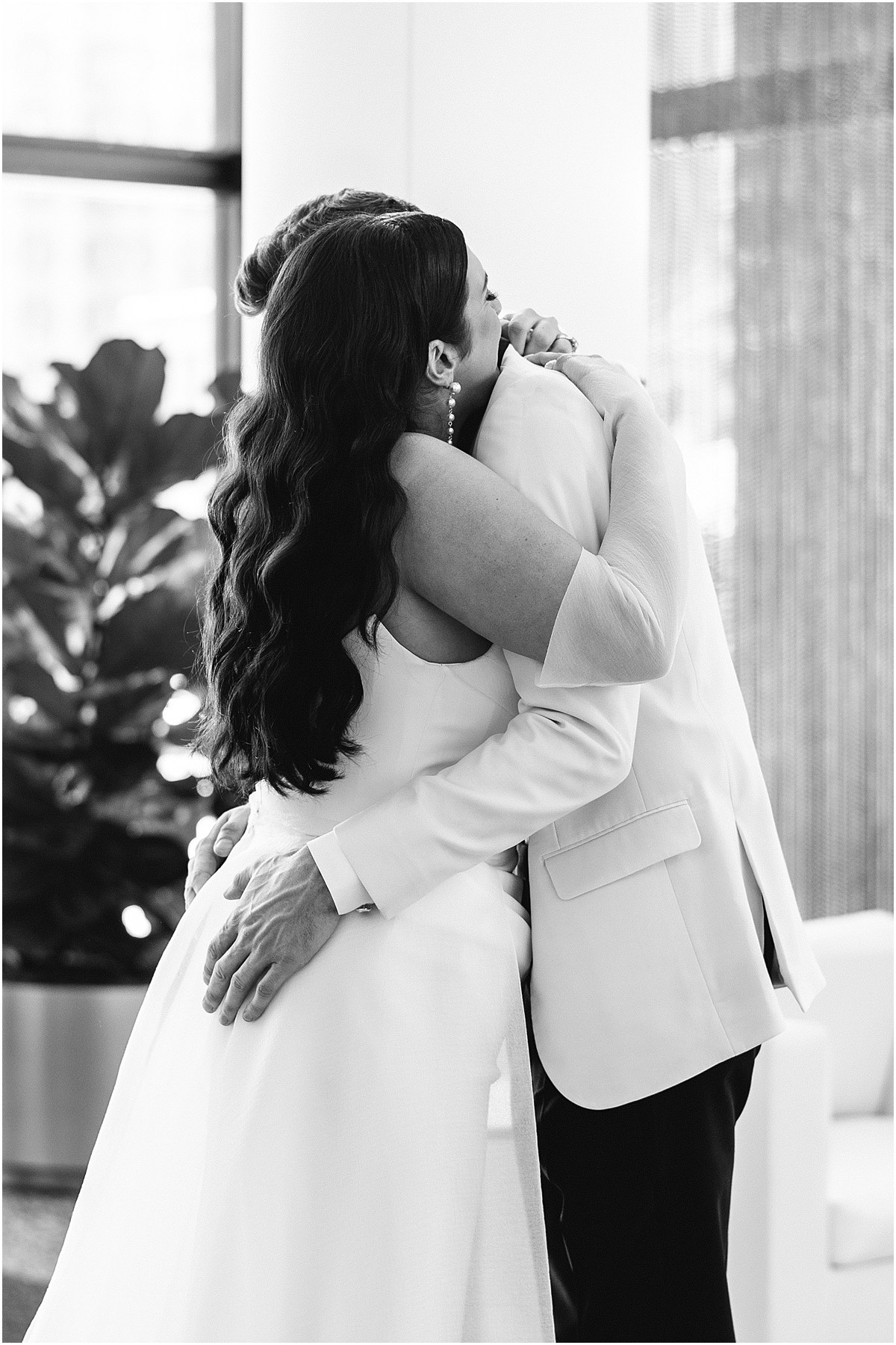 bride and groom hug during first look