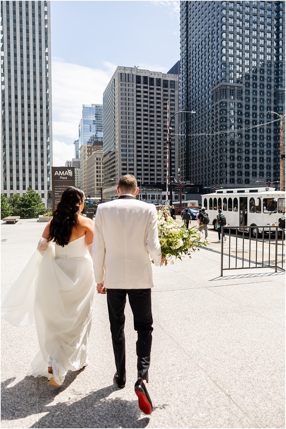 couple walk in downtown Chicago
