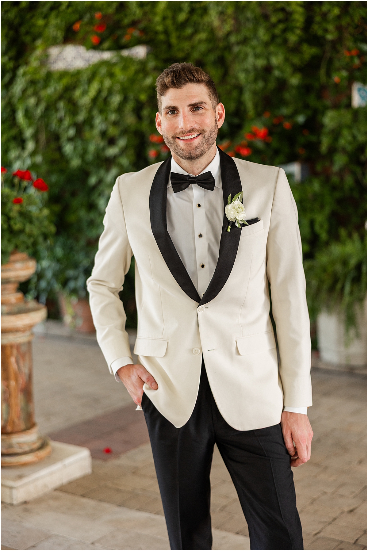 groom portraits in white tux