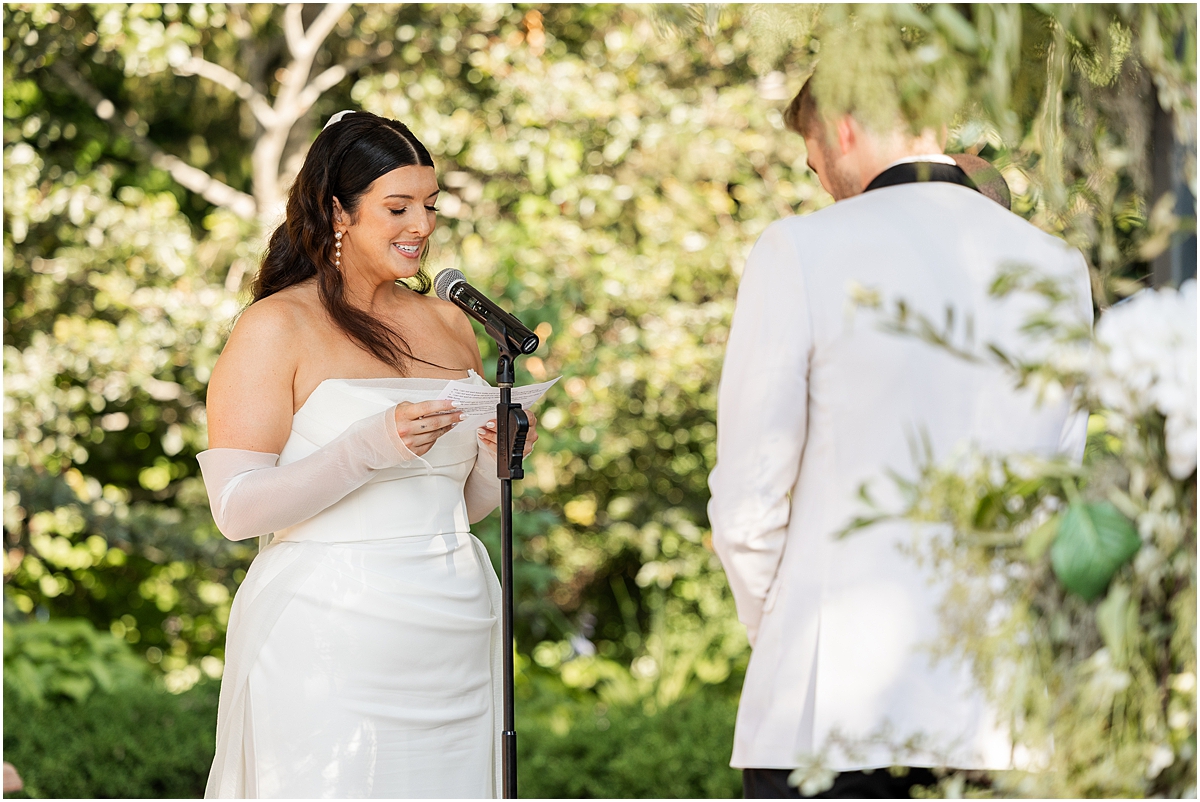 brude reading her vows during Galleria Marchetti Summer Wedding in Chicago