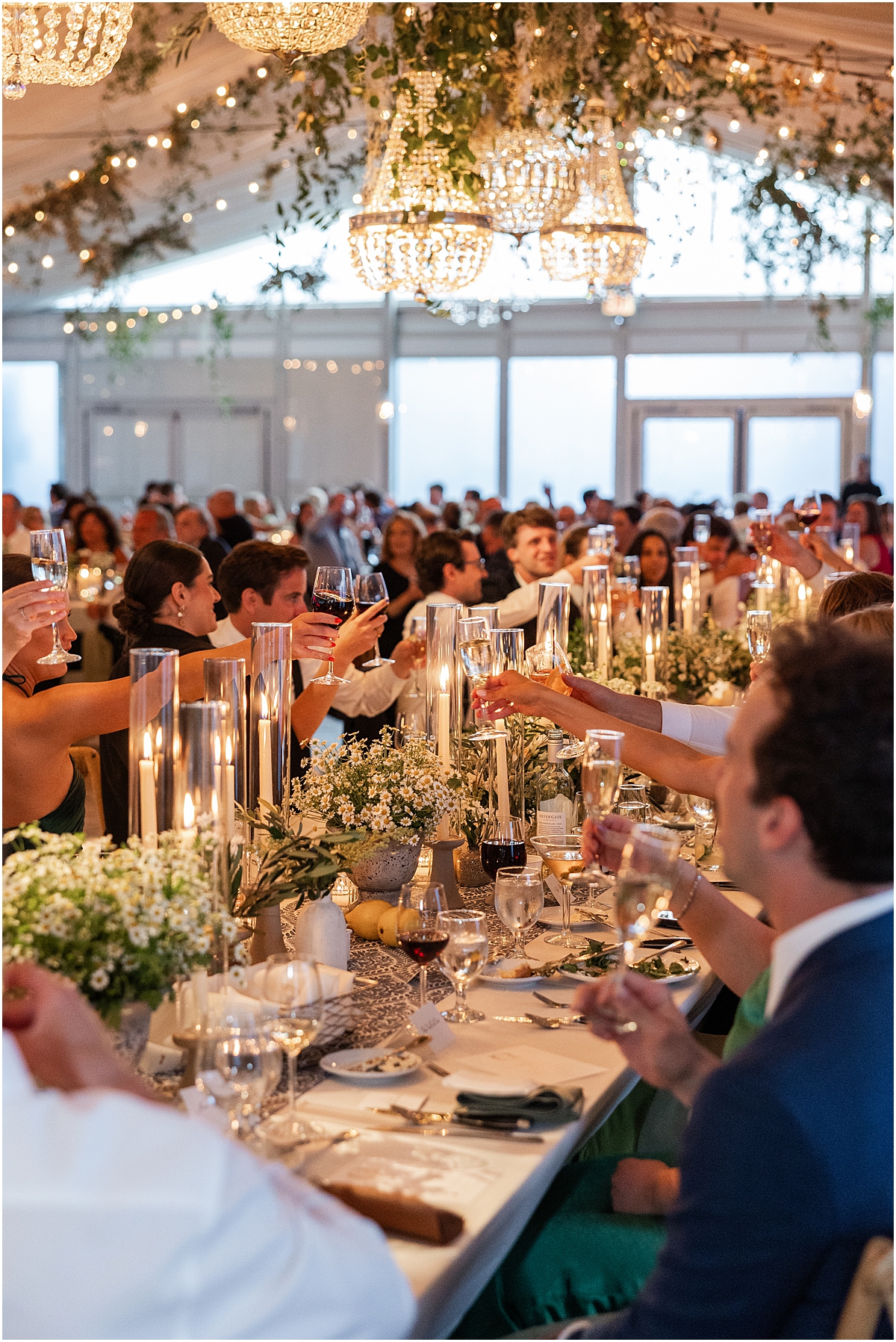 guests toast to newlyweds at Galleria Marchetti Summer Wedding in Chicago