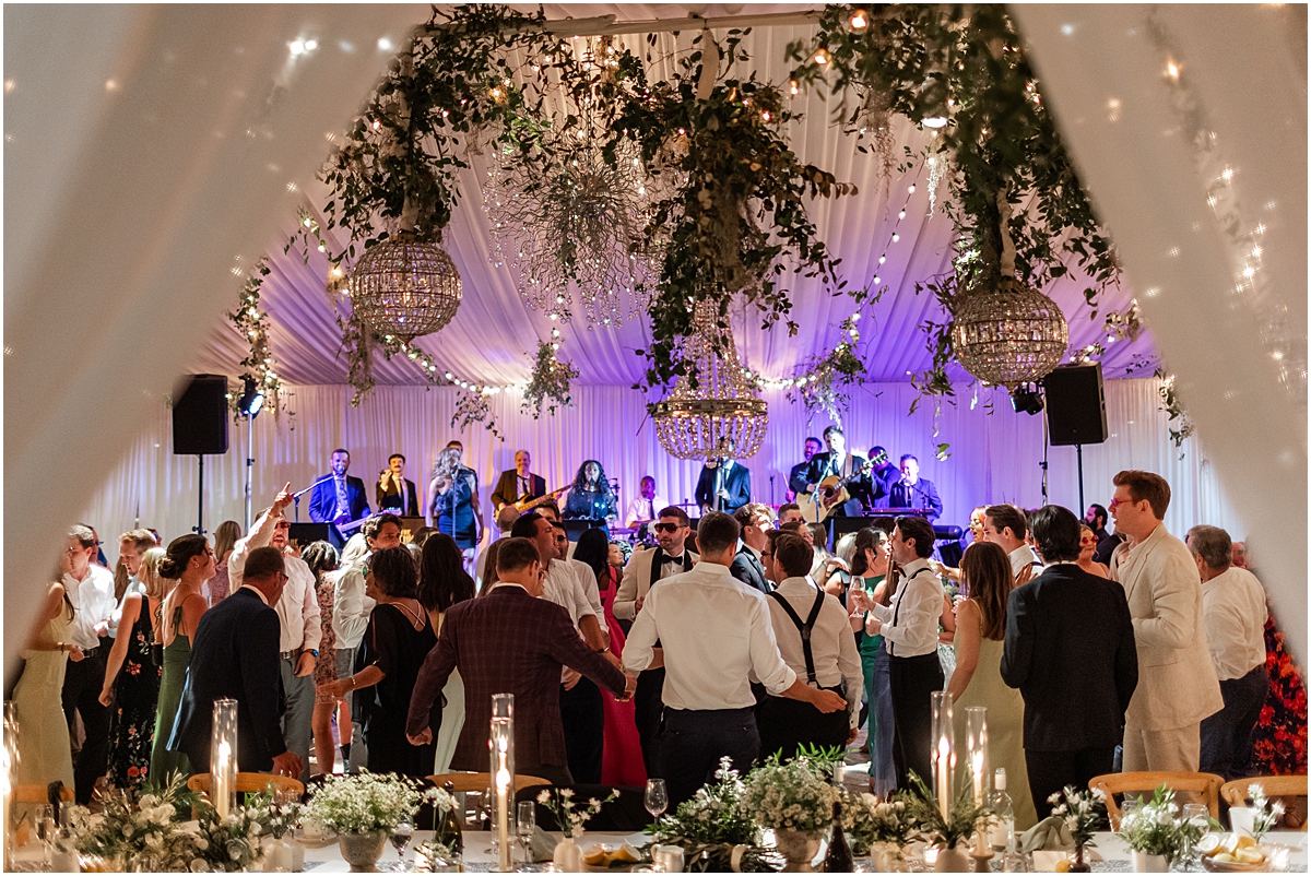 guests on the dance floor at summer wedding at Galleria Marchetti