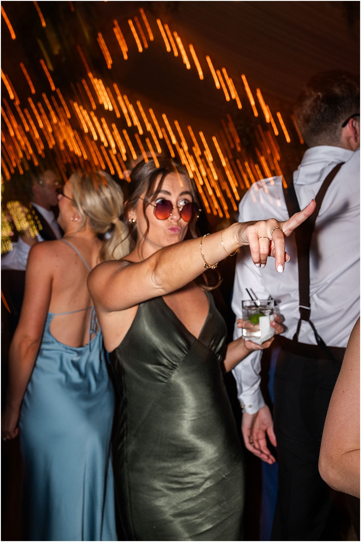 woman with sunglasses on the dance floor