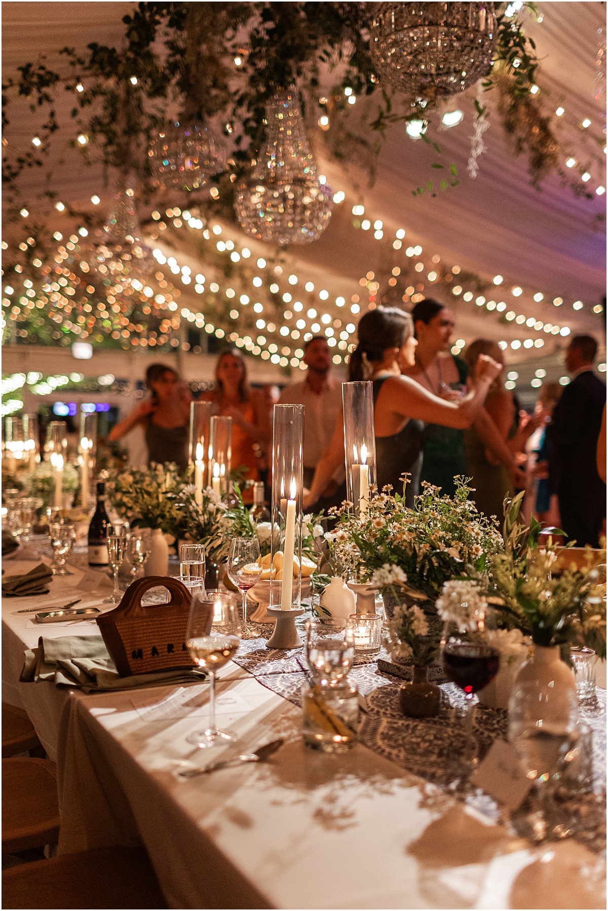 stringed lights add a romantic glow to Galleria Marchetti Summer Wedding reception in Chicago