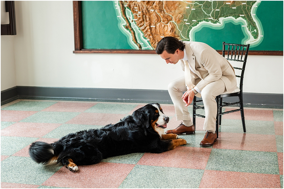 groom with dog