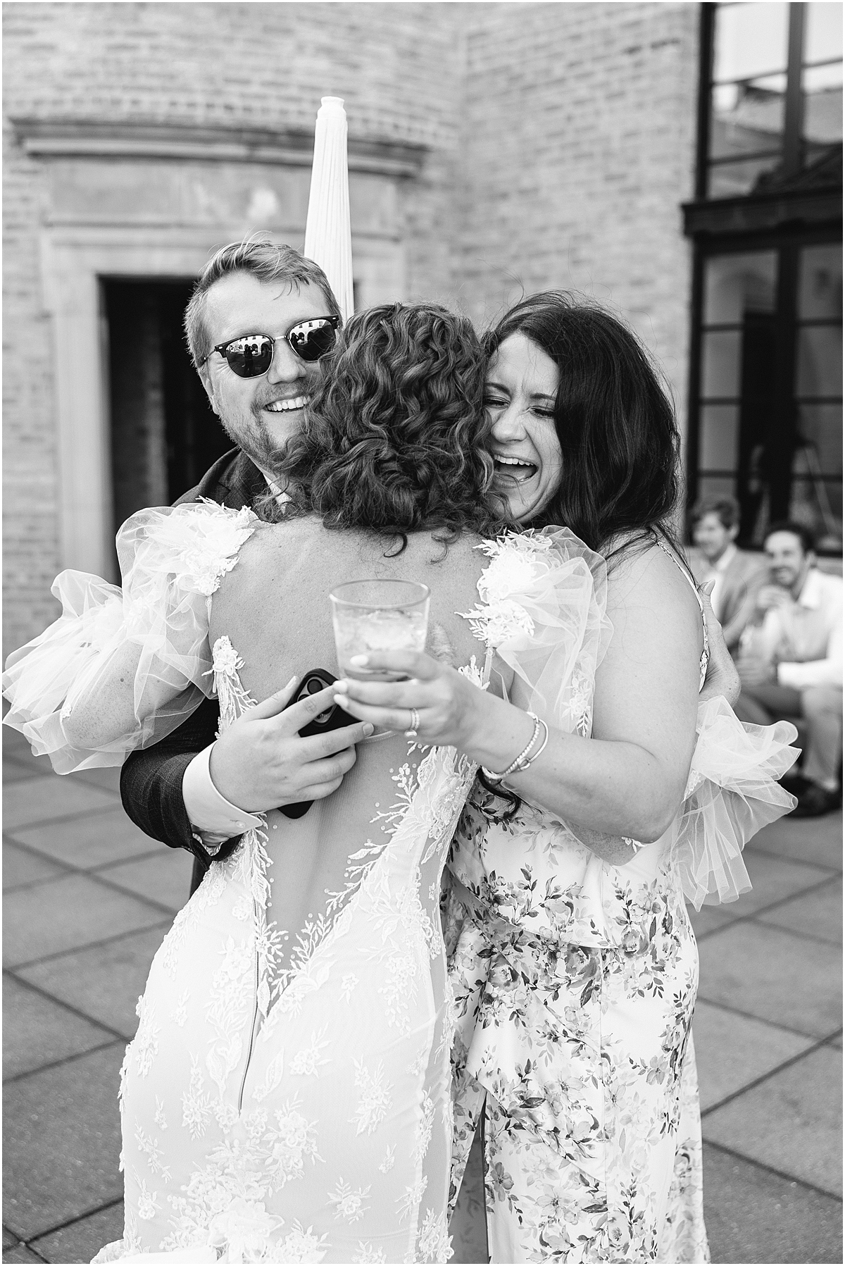 bride hugs guests