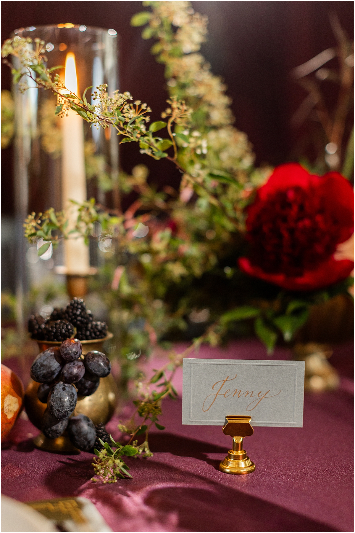 blueberries and blackberries mixed with dark red flowers and greenery add texture and depth to Colvin House Wedding Editorial