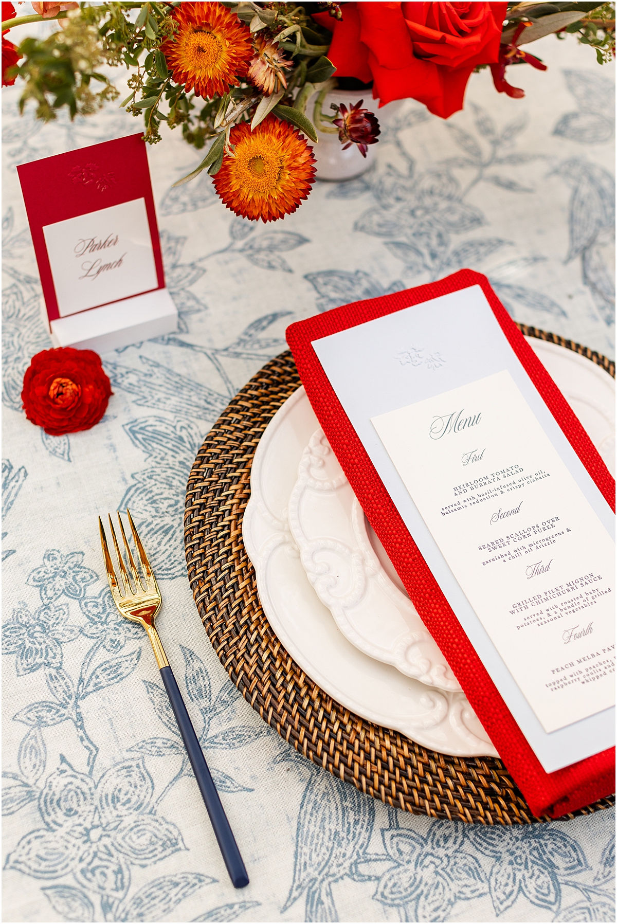 white menus on bright red napkins