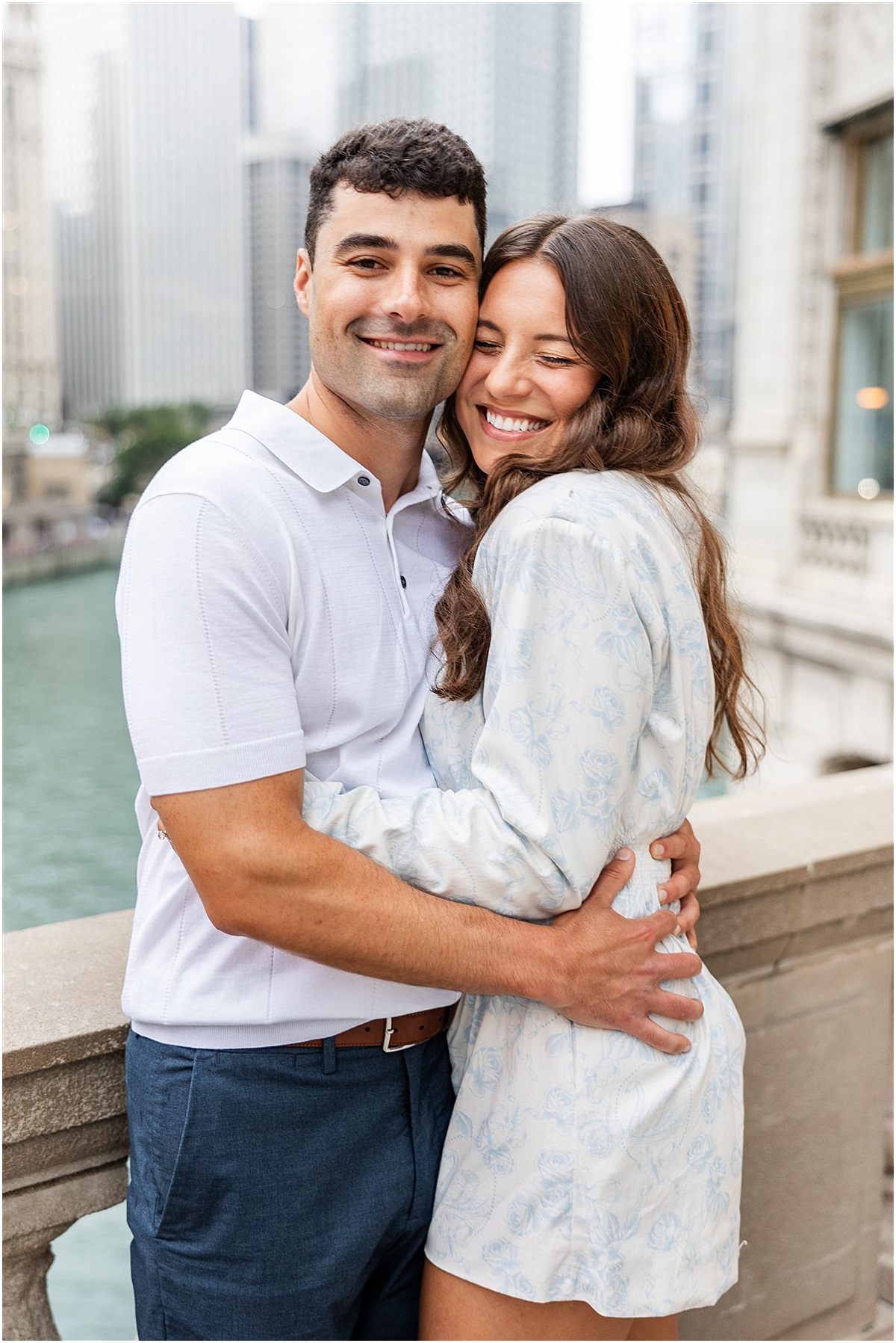 engaged couple hug in downtown Chicago