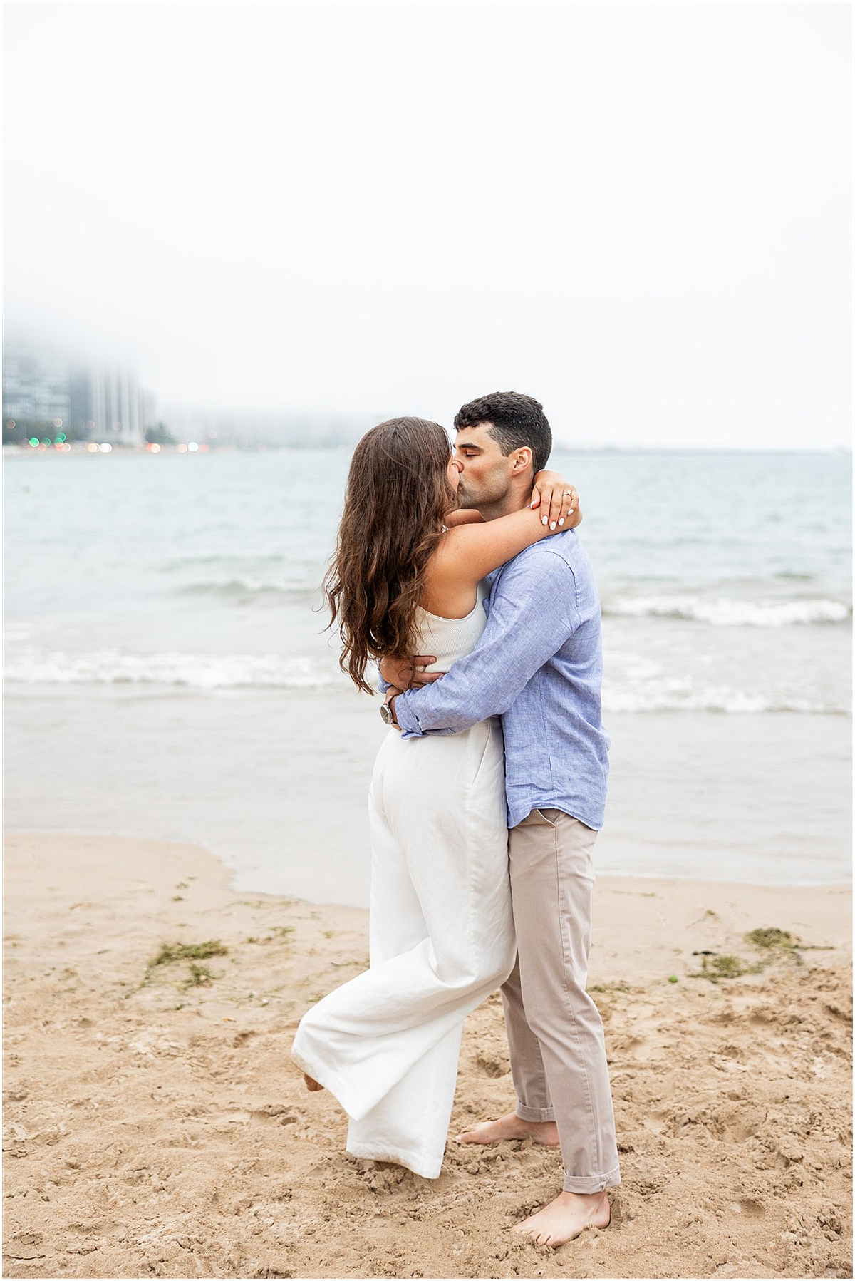 romantic engagement photo of couple at North Avenue Beach