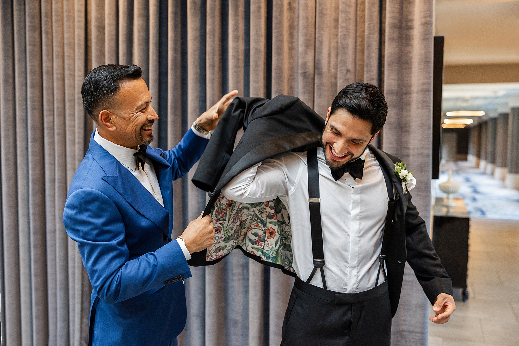 groom getting in tux