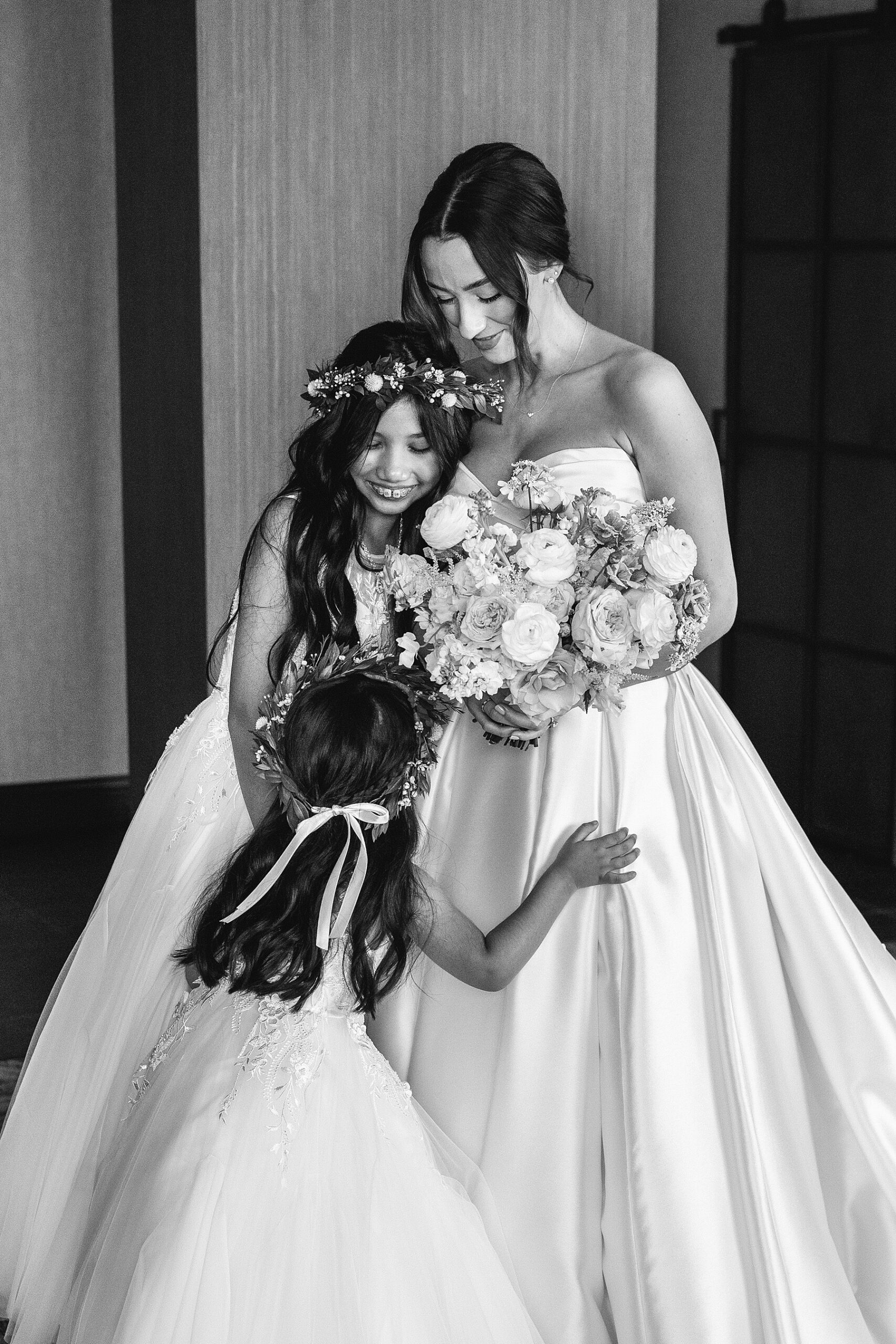 bride with flower girls 